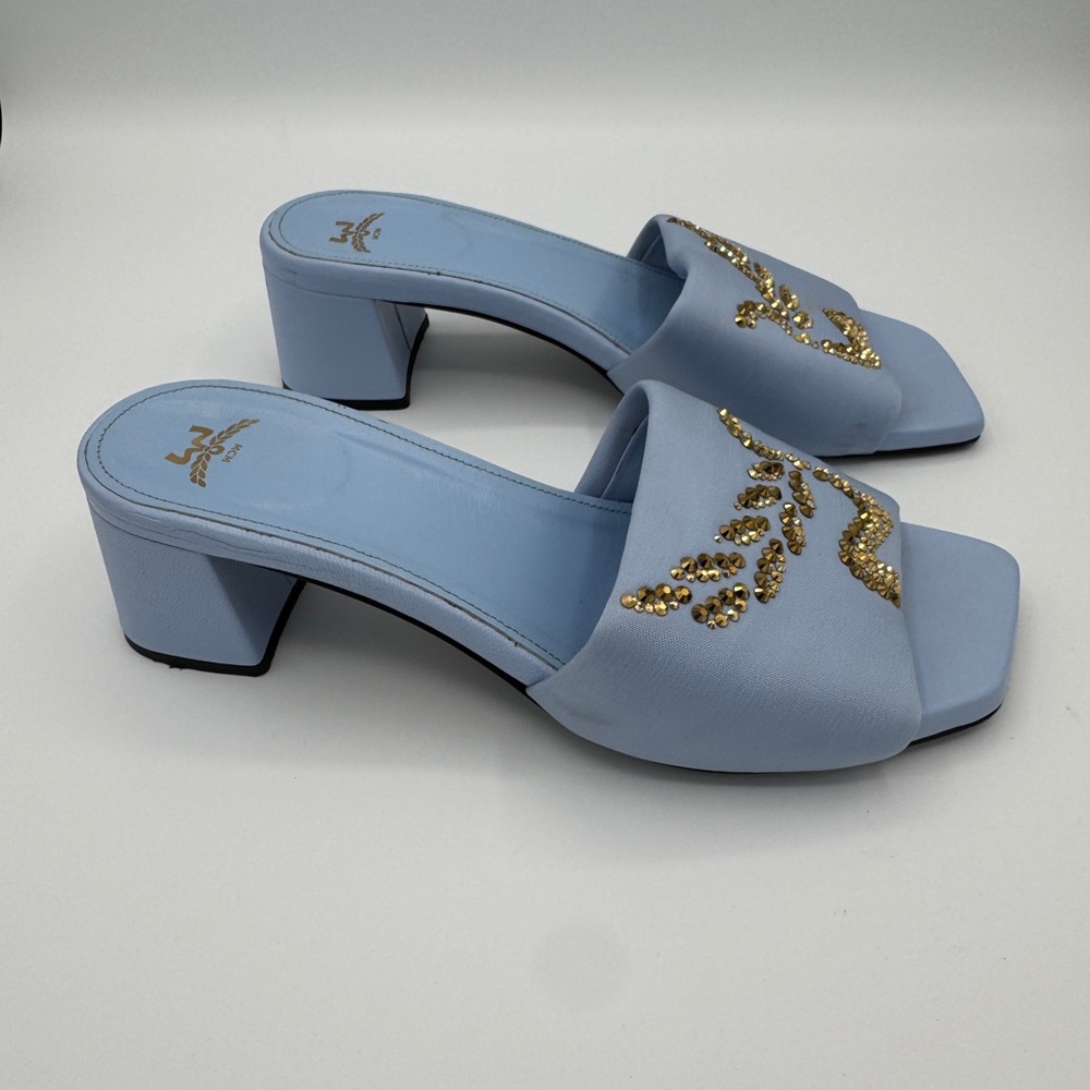 MCM Light Blue Slip-On Block Heel Mules with Gold Embellishment